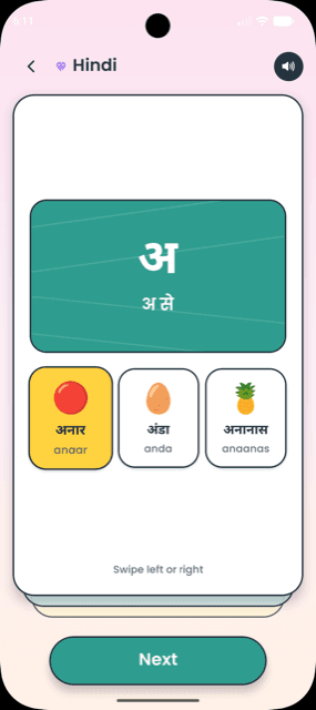 TinyLearn Hindi Varnamala flashcard for the letter अ with the words अनार, अंडा and अनानास
